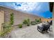 Landscaped backyard with paver patio, lounge seating and well-maintained plantings at 2651 Deep Canyon St, Henderson, NV 89044