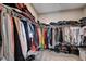 Walk-in closet featuring built-in shelving, hanging rods, and plenty of storage space at 2651 Deep Canyon St, Henderson, NV 89044