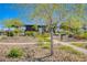 Community overlook signage amidst lush greenery and gravel pathways, creating an inviting space at 2651 Deep Canyon St, Henderson, NV 89044