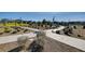 A walking path with landscaping in the community park area for residents to enjoy at 2651 Deep Canyon St, Henderson, NV 89044