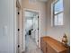 Hallway leading to bedrooms with gray carpet and a light and airy feel at 2651 Deep Canyon St, Henderson, NV 89044