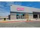 A modern ice cream shop with a gray exterior, large windows, and inviting signage, complemented by clean sidewalks at 2651 Deep Canyon St, Henderson, NV 89044