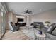 Cozy living room with stylish decor, hardwood floors, and a comfortable seating arrangement at 2651 Deep Canyon St, Henderson, NV 89044