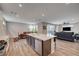 Open concept living space showcases kitchen, dining, and living areas, perfect for entertaining at 2651 Deep Canyon St, Henderson, NV 89044