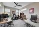 Upstairs room featuring two work spaces, lots of natural light, and a ceiling fan at 2651 Deep Canyon St, Henderson, NV 89044