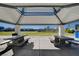 A covered picnic area offers tables and a view of the community playground at 2651 Deep Canyon St, Henderson, NV 89044