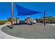 A neighborhood playground including a shaded picnic area and play equipment at 2651 Deep Canyon St, Henderson, NV 89044