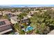 A beautiful property featuring a refreshing pool, lush greenery, and a well-maintained outdoor space at 2717 Cool Lilac Ave, Henderson, NV 89052