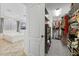 Bathroom featuring a soaking tub next to a walk-in closet at 2717 Cool Lilac Ave, Henderson, NV 89052