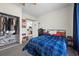 Bedroom featuring closet and bed with natural light at 2717 Cool Lilac Ave, Henderson, NV 89052