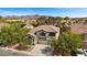 Attractive home featuring a well-maintained front yard and a two-car garage at 2717 Cool Lilac Ave, Henderson, NV 89052