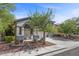 Charming two-story home featuring a well-maintained front yard and an attached two-car garage at 2717 Cool Lilac Ave, Henderson, NV 89052