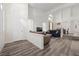 Spacious living room with wood floors and open floor plan is ideal for modern living and entertaining at 2717 Cool Lilac Ave, Henderson, NV 89052