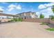 Large backyard with privacy wall and lush greenery at 311 Lilian Faith Ave, North Las Vegas, NV 89031