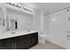 Bright bathroom with dual sinks and shower-tub combination at 311 Lilian Faith Ave, North Las Vegas, NV 89031