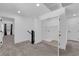 Upstairs landing and hallway with carpet and access to the laundry closet at 311 Lilian Faith Ave, North Las Vegas, NV 89031