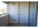 Balcony view shows a sliding glass door and utility closet doors at 3400 Cabana Dr # 2010, Las Vegas, NV 89122