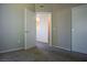 Neutral carpeted bedroom features a closet with an open doorway looking into another room at 3400 Cabana Dr # 2010, Las Vegas, NV 89122