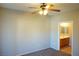Comfortable bedroom features a ceiling fan, plush carpeting and an attached bathroom at 3400 Cabana Dr # 2010, Las Vegas, NV 89122