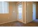 A cozy bedroom that offers a private balcony and convenient closet space for storage at 3400 Cabana Dr # 2010, Las Vegas, NV 89122
