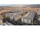 Aerial view showcasing the condo complex with well-manicured lawns, community spaces, and surrounding desert landscape at 3550 Bay Sands Dr # 1003, Laughlin, NV 89029