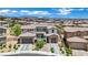 Stunning aerial view of home showcasing a spacious layout, multiple car garage and meticulous landscaping at 362 Port Reggio St, Las Vegas, NV 89138