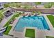 An aerial view of a backyard pool, outdoor kitchen, and lush landscaping at 362 Port Reggio St, Las Vegas, NV 89138