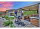 Spacious outdoor kitchen, grill, backyard with inviting pool, perfect for entertaining and outdoor living at 362 Port Reggio St, Las Vegas, NV 89138