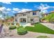 Beautiful backyard featuring a pool, lush green turf, and a well-maintained landscape at 362 Port Reggio St, Las Vegas, NV 89138