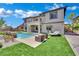Inviting backyard pool area with lounge seating and lush landscaping at 362 Port Reggio St, Las Vegas, NV 89138