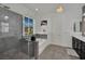 Modern bathroom with a glass-enclosed shower, soaking tub, and sleek vanity at 362 Port Reggio St, Las Vegas, NV 89138