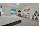 Bright primary bedroom featuring neutral walls, and multiple plants for a calming atmosphere at 362 Port Reggio St, Las Vegas, NV 89138