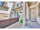 Inviting front porch featuring a cozy outdoor fireplace, perfect for relaxing and entertaining at 362 Port Reggio St, Las Vegas, NV 89138