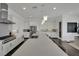 Spacious kitchen features pendant lighting, stainless steel appliances, and a center island at 362 Port Reggio St, Las Vegas, NV 89138