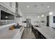 Bright kitchen features stainless steel appliances and a large island with sink at 362 Port Reggio St, Las Vegas, NV 89138
