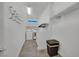Clean laundry room with modern washer and dryer, utility sink, and storage at 362 Port Reggio St, Las Vegas, NV 89138