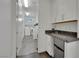 Bright laundry space with a modern washer and dryer and utility sink at 362 Port Reggio St, Las Vegas, NV 89138