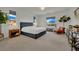 Spacious main bedroom with natural light, stylish furniture, and serene ambiance at 362 Port Reggio St, Las Vegas, NV 89138