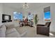 Well-lit office space with large windows and a comfortable seating area at 362 Port Reggio St, Las Vegas, NV 89138