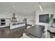 Spacious open-concept kitchen with a large island, stainless appliances, and elegant white cabinets at 362 Port Reggio St, Las Vegas, NV 89138