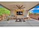 Gourmet outdoor kitchen featuring a built-in grill, counter space, and modern appliances at 362 Port Reggio St, Las Vegas, NV 89138