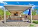 Outdoor kitchen with a covered patio and bar seating, perfect for entertaining at 362 Port Reggio St, Las Vegas, NV 89138