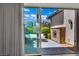 Inviting outdoor patio with comfortable seating and a stone fireplace perfect for relaxing at 362 Port Reggio St, Las Vegas, NV 89138