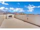 Open roof deck featuring an outdoor fireplace and scenic mountain views at 362 Port Reggio St, Las Vegas, NV 89138