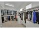 Spacious walk-in closet with ample shelving, drawers, and clothing racks for organized storage at 362 Port Reggio St, Las Vegas, NV 89138