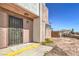 Front of a residential townhome featuring a security door and gate with the unit number above the doorway at 3683 Villa Knolls East Dr, Las Vegas, NV 89120