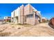 Exterior view showing a residential unit with textured walls, and some outdoor seating visible to the side at 3683 Villa Knolls East Dr, Las Vegas, NV 89120