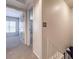 Upstairs hallway with neutral carpet, leading to bedrooms and other living spaces at 3683 Villa Knolls East Dr, Las Vegas, NV 89120