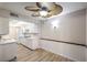 Open-concept living area with view into updated kitchen at 3683 Villa Knolls East Dr, Las Vegas, NV 89120