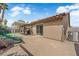 Spacious backyard featuring a covered patio, barbecue, and slide, perfect for outdoor enjoyment at 3905 Blairmoor St, North Las Vegas, NV 89032